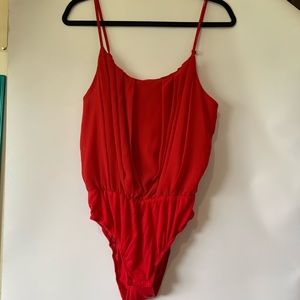 Red bodysuit from Jeans Warehouse
